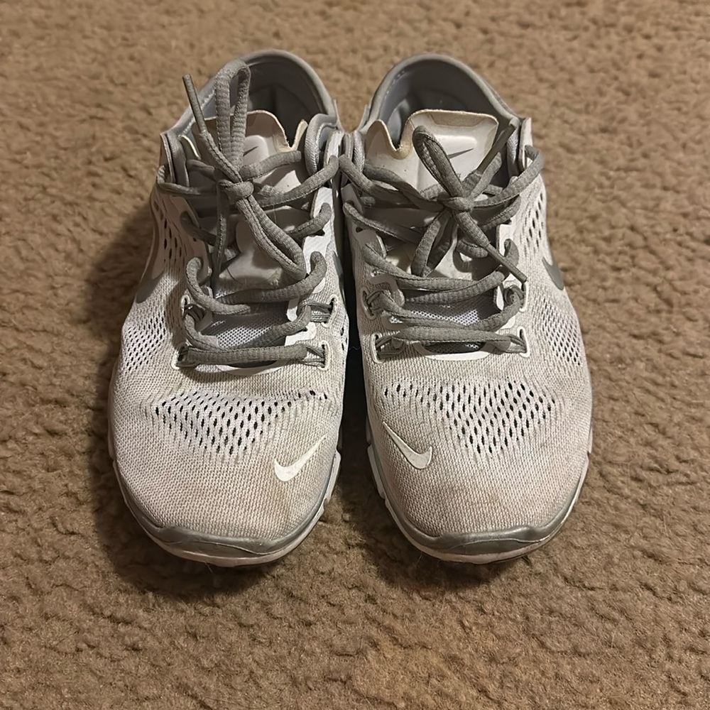 White and grey Nike sneakers